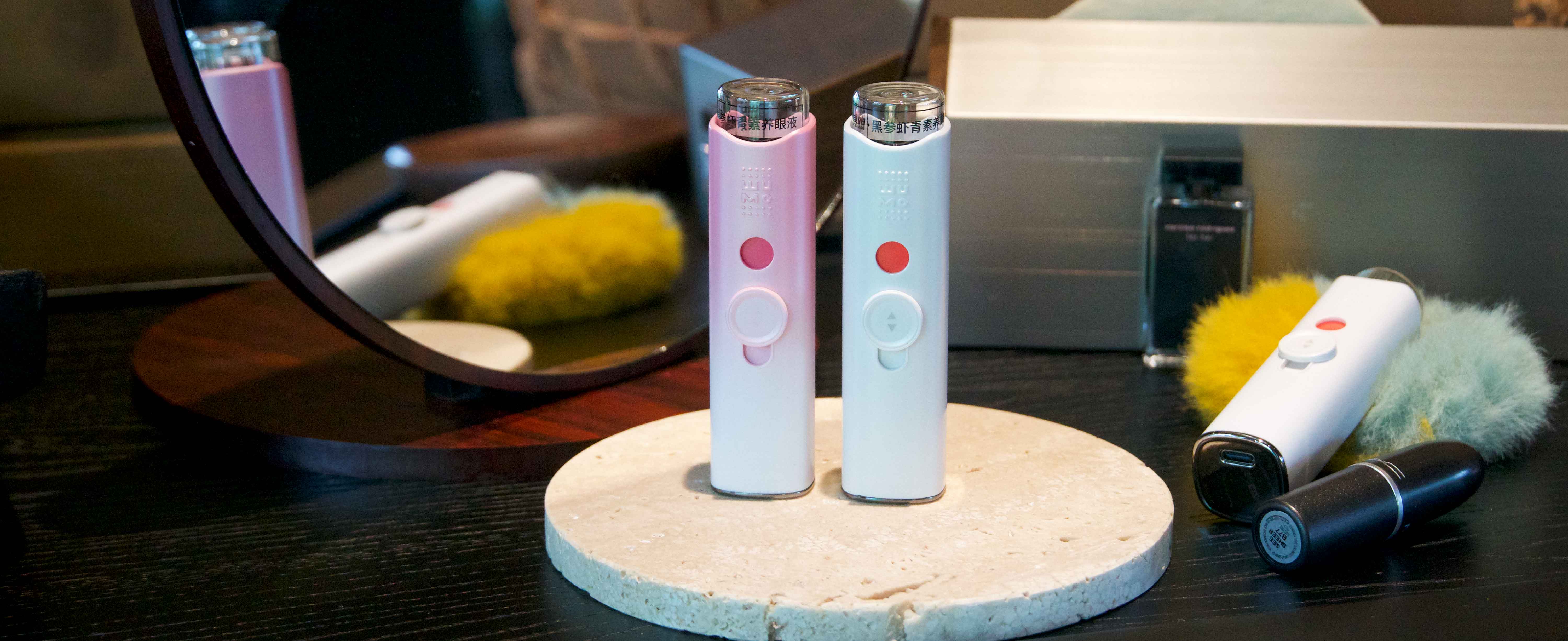 A-professional-discreetly-using-a-portable-office-eye-mist-at-their-desk