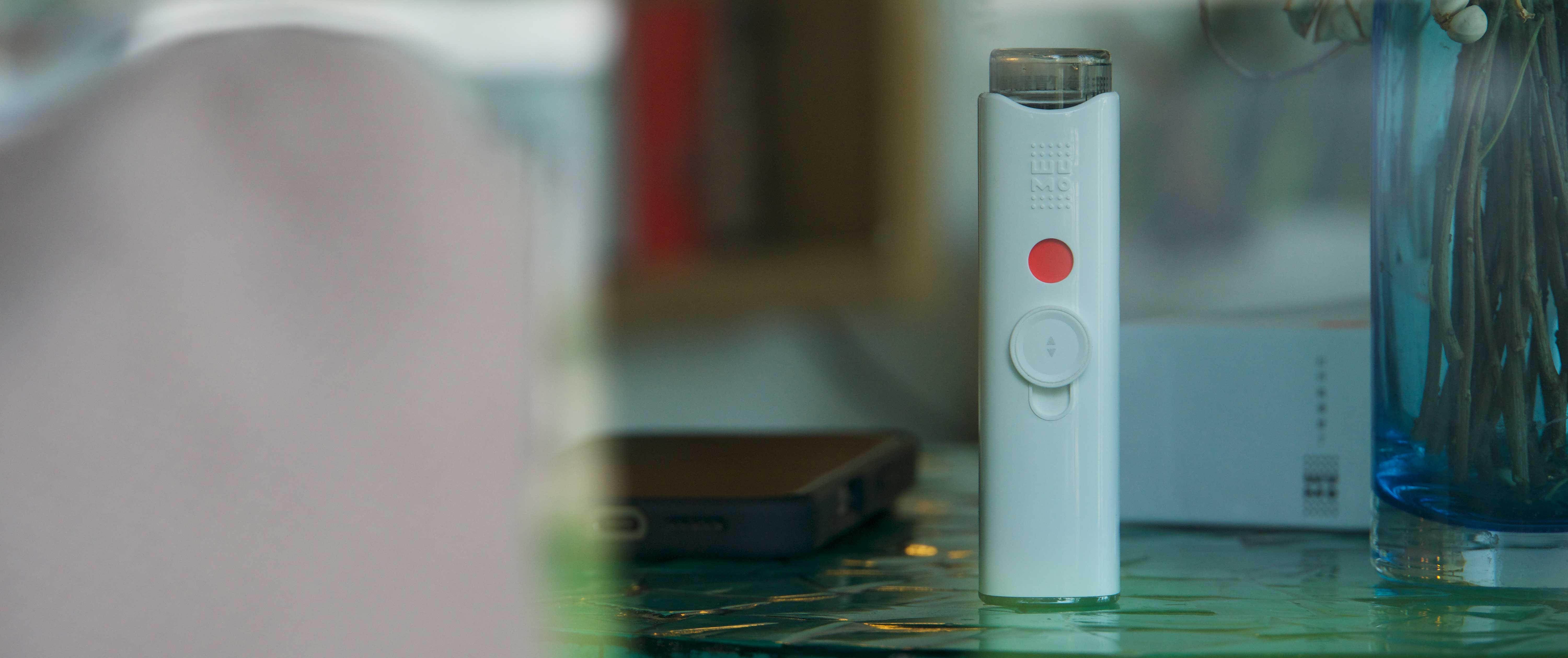 A-detailed-product-shot-of-the-Wumo-Eye-Mister,-highlighting-its-sleek-design-and-mist-nozzle